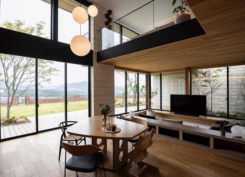 大開口で内と外をシームレスにつないだ家